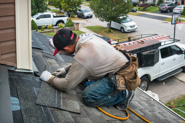 Professional Roofing technician working in Bushwood, MD
